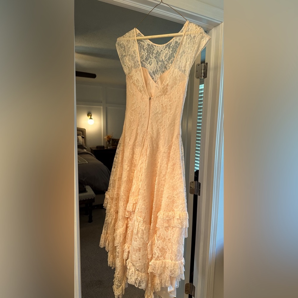 Vintage prom dress from the ‘80’s still in good condition.